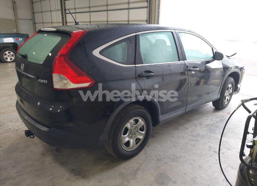 Photo 4 of 2014 Honda Cr-v LX (VIN 2HKRM4H36EH662225)
