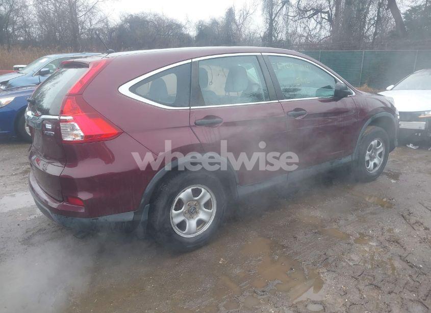 Photo 4 of 2015 Honda Cr-v LX (VIN 2HKRM4H36FH689815)