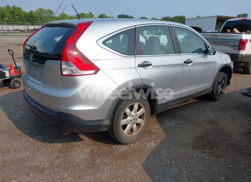 Photo 4 of 2013 Honda Cr-v LX (VIN 2HKRM4H37DH605174)