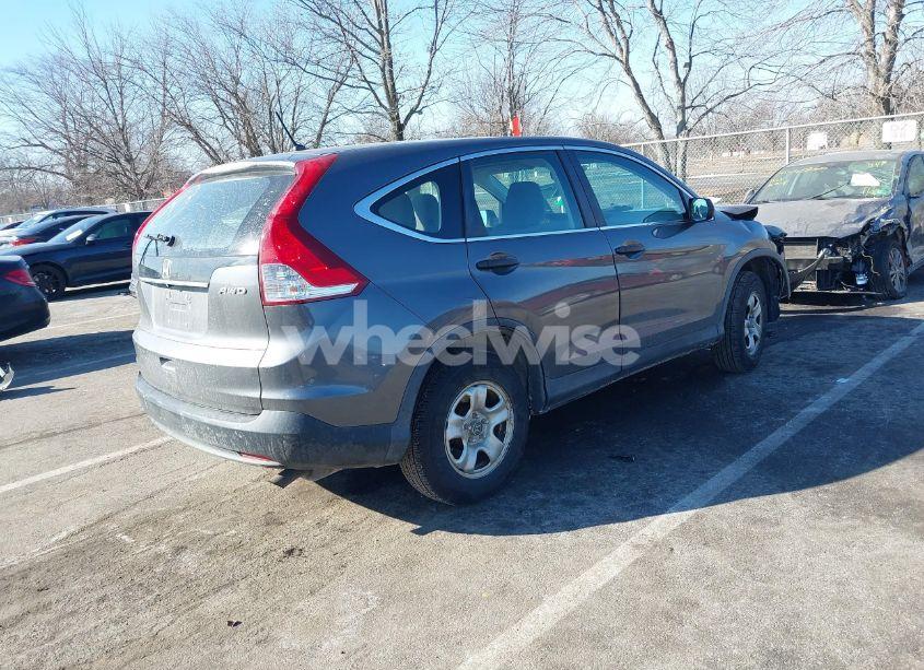 Photo 4 of 2013 Honda Cr-v LX (VIN 2HKRM4H37DH670980)