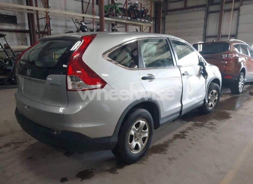 Photo 4 of 2013 Honda Cr-v LX (VIN 2HKRM4H37DH685575)