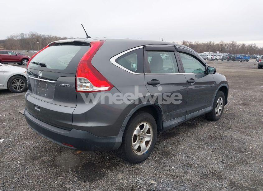 Photo 4 of 2014 Honda Cr-v LX (VIN 2HKRM4H37EH609050)