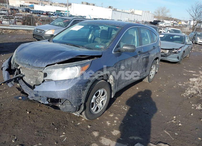 Photo 2 of 2014 Honda Cr-v LX (VIN 2HKRM4H37EH613664)