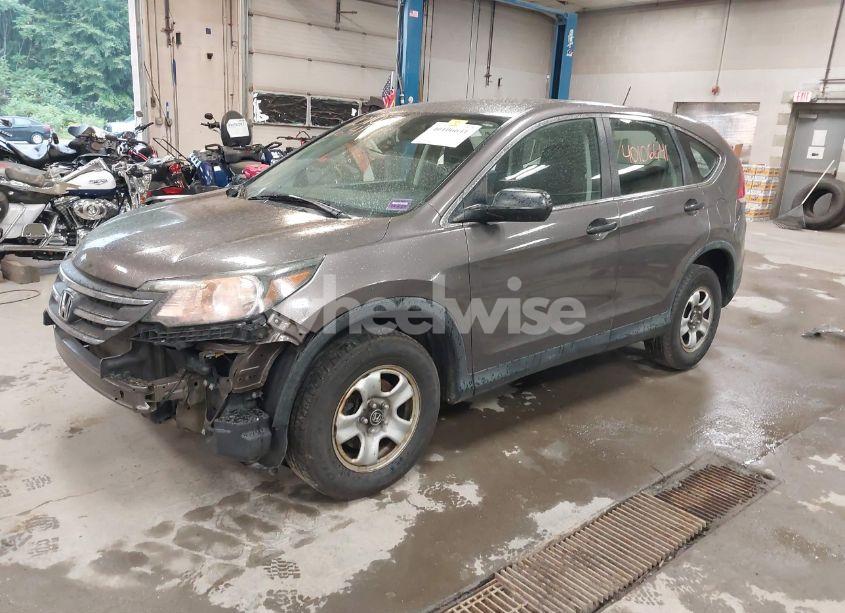 Photo 2 of 2014 Honda Cr-v LX (VIN 2HKRM4H37EH625880)