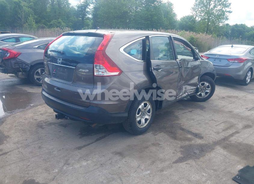 Photo 4 of 2014 Honda Cr-v LX (VIN 2HKRM4H37EH625913)