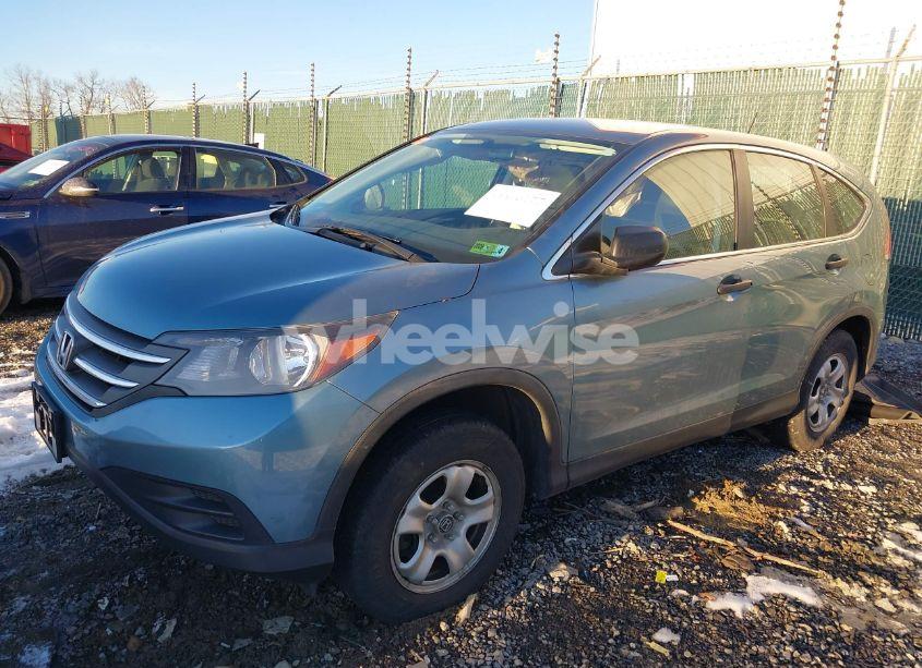 Photo 2 of 2014 Honda Cr-v LX (VIN 2HKRM4H37EH633252)
