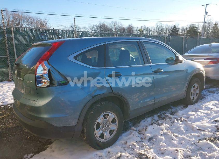 Photo 4 of 2014 Honda Cr-v LX (VIN 2HKRM4H37EH633252)