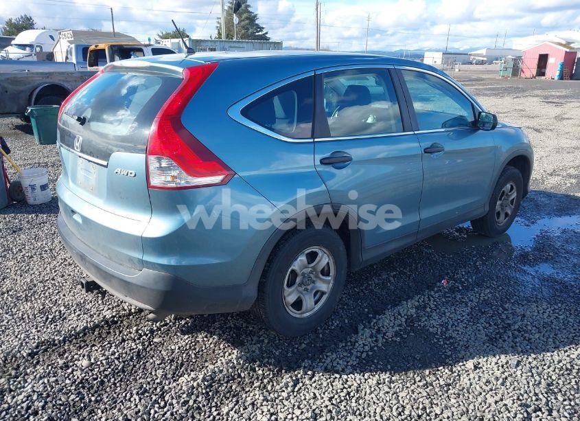 Photo 4 of 2014 Honda Cr-v LX (VIN 2HKRM4H38EH603841)