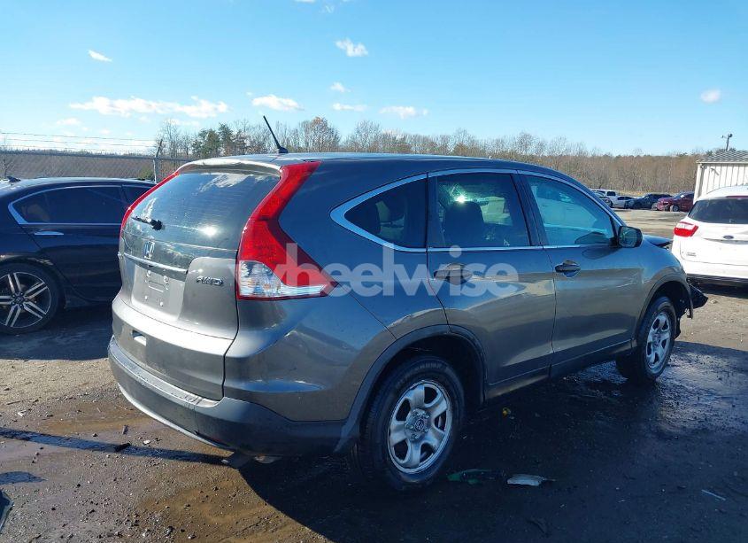 Photo 4 of 2014 Honda Cr-v LX (VIN 2HKRM4H38EH610353)