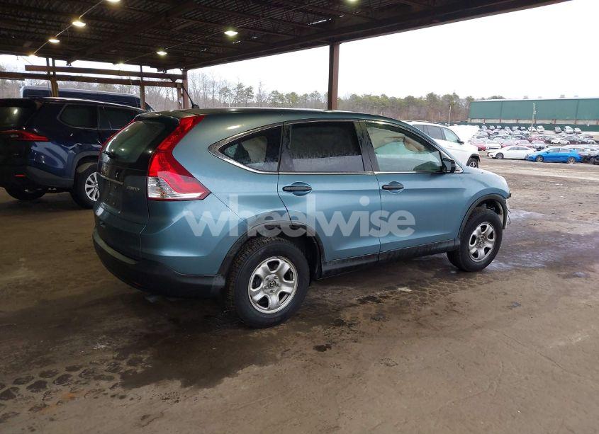 Photo 4 of 2014 Honda Cr-v LX (VIN 2HKRM4H38EH625225)