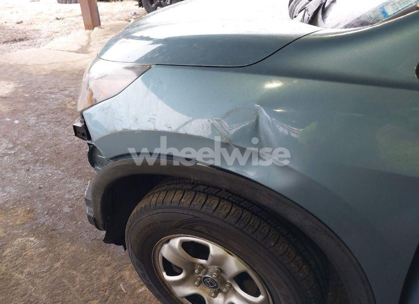 Photo 6 of 2014 Honda Cr-v LX (VIN 2HKRM4H38EH625225)