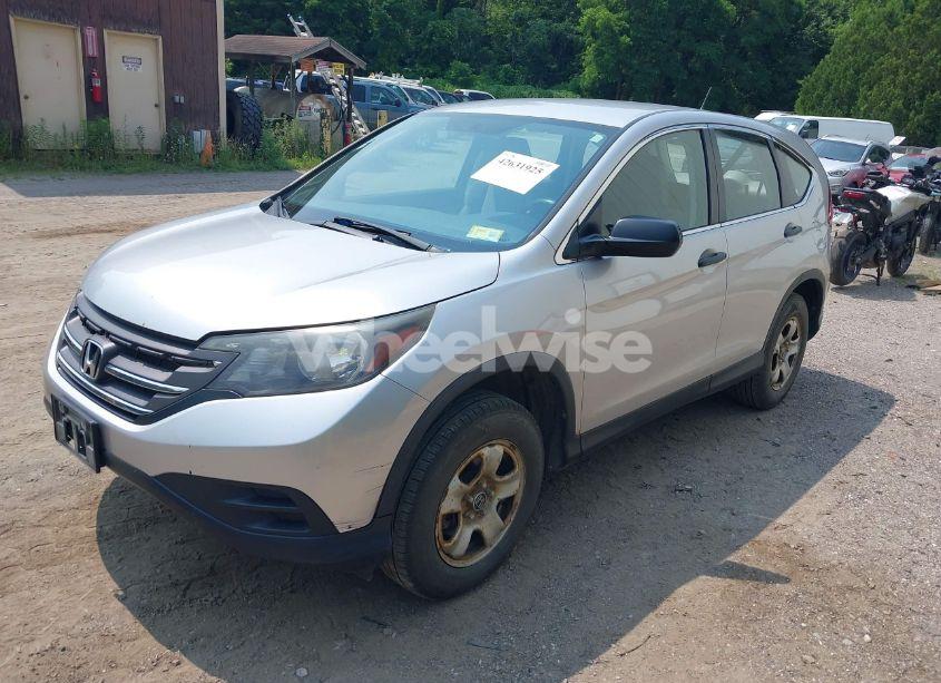 Photo 2 of 2014 Honda Cr-v LX (VIN 2HKRM4H38EH672867)