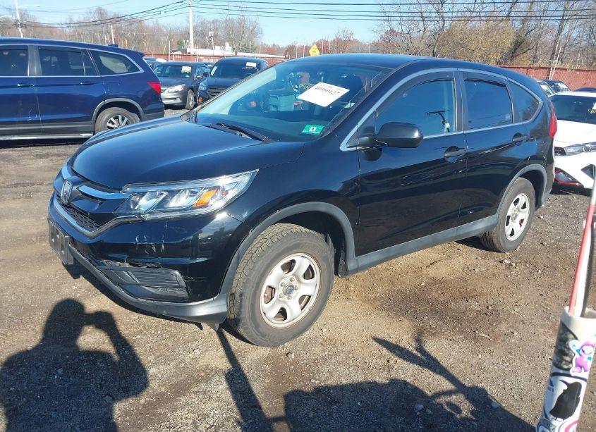 Photo 2 of 2015 Honda Cr-v LX (VIN 2HKRM4H38FH697107)