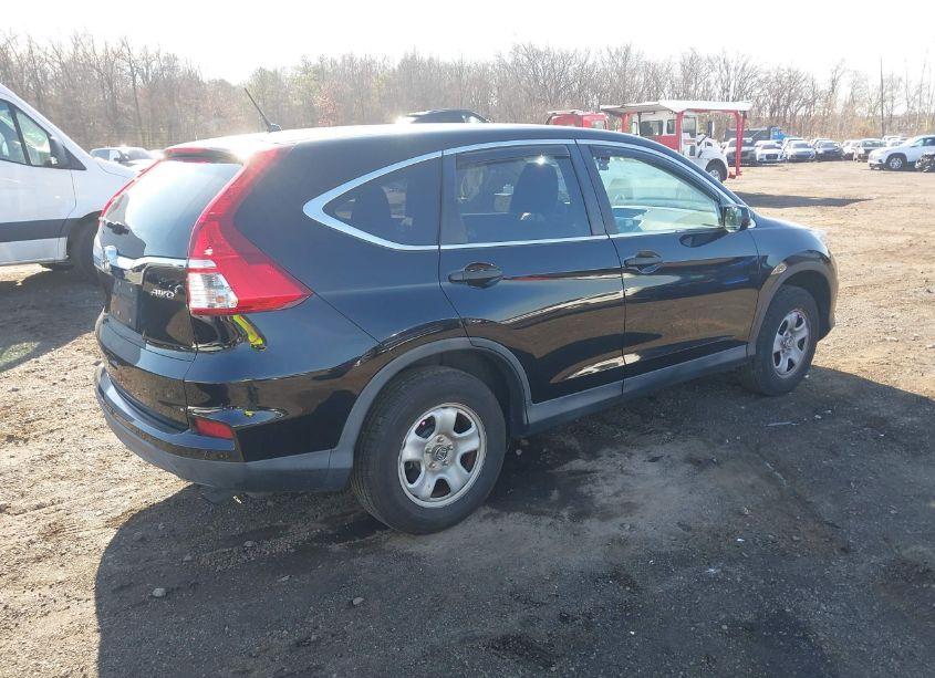 Photo 4 of 2015 Honda Cr-v LX (VIN 2HKRM4H38FH697107)