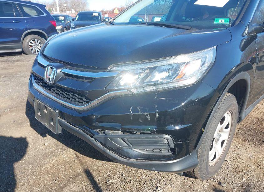 Photo 6 of 2015 Honda Cr-v LX (VIN 2HKRM4H38FH697107)