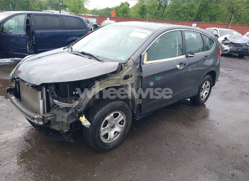 Photo 2 of 2016 Honda Cr-v LX (VIN 2HKRM4H38GH609609)
