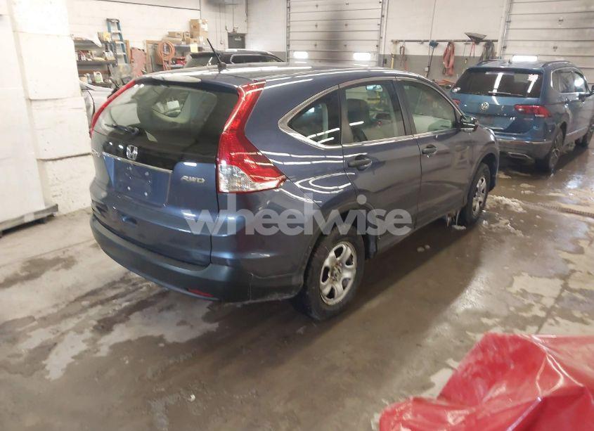Photo 4 of 2014 Honda Cr-v LX (VIN 2HKRM4H39EH618848)