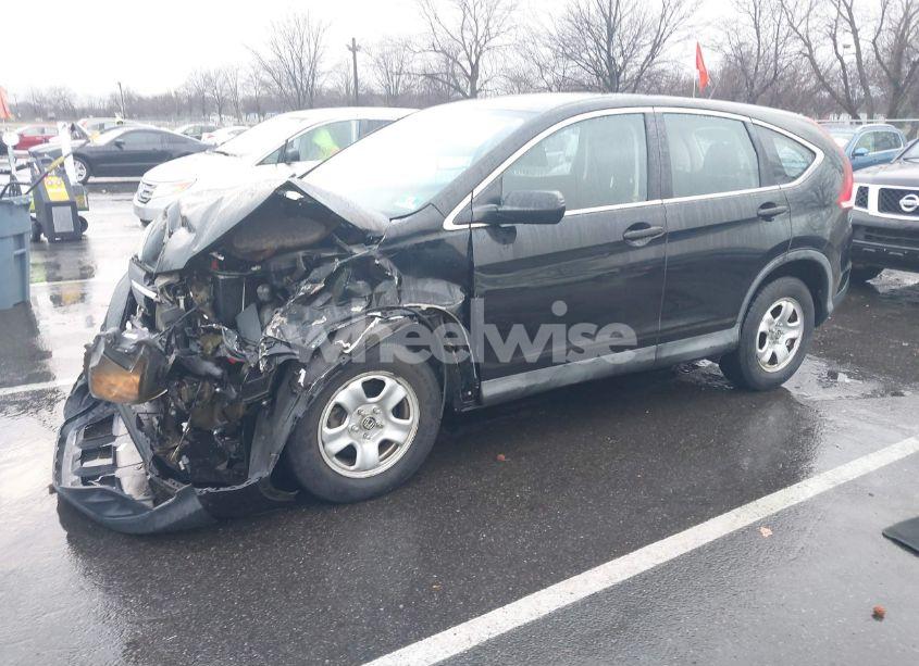 Photo 2 of 2014 Honda Cr-v LX (VIN 2HKRM4H39EH672781)