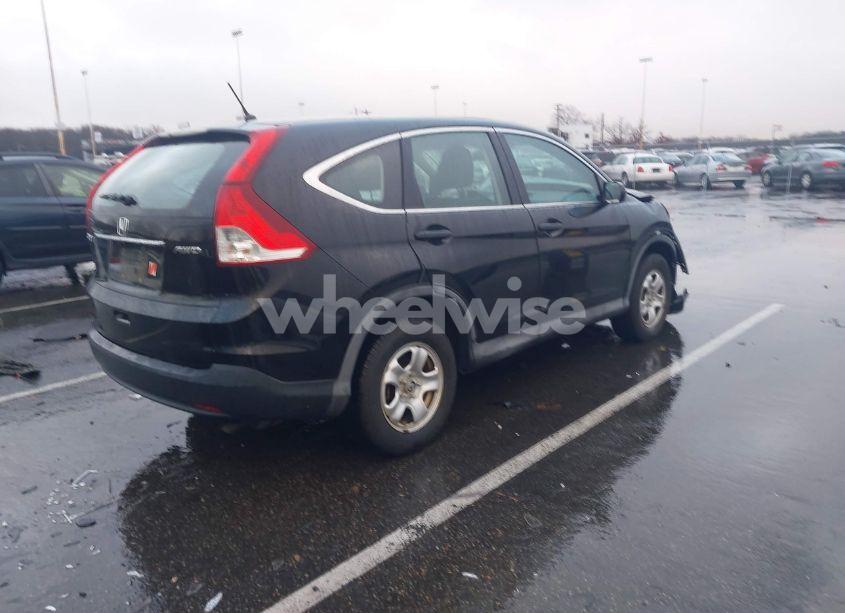 Photo 4 of 2014 Honda Cr-v LX (VIN 2HKRM4H39EH672781)