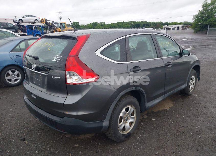 Photo 4 of 2014 Honda Cr-v LX (VIN 2HKRM4H39EH707352)