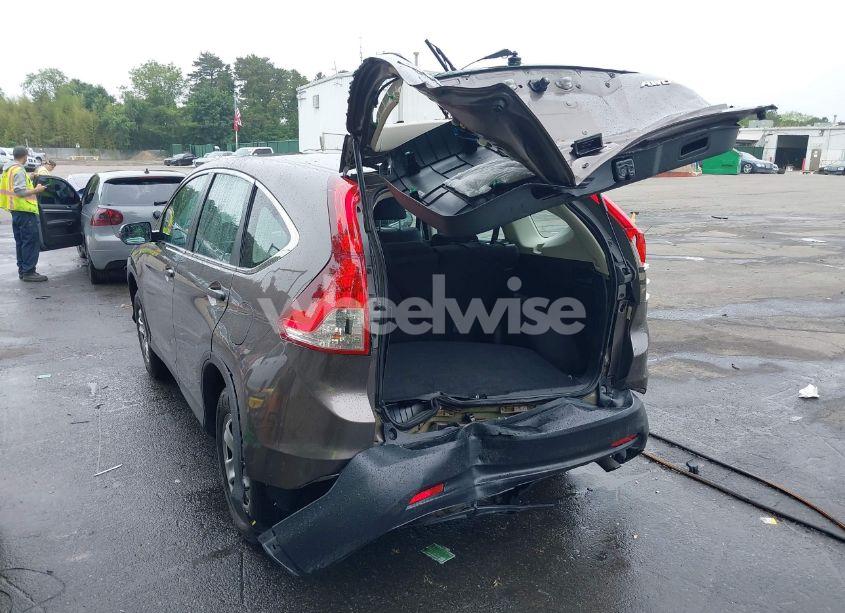 Photo 3 of 2014 Honda Cr-v LX (VIN 2HKRM4H39EH724054)