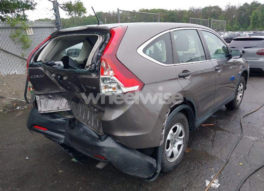 Photo 4 of 2014 Honda Cr-v LX (VIN 2HKRM4H39EH724054)