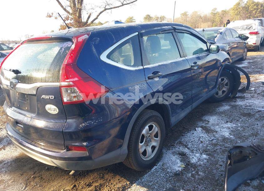 Photo 4 of 2015 Honda Cr-v LX (VIN 2HKRM4H39FH627910)