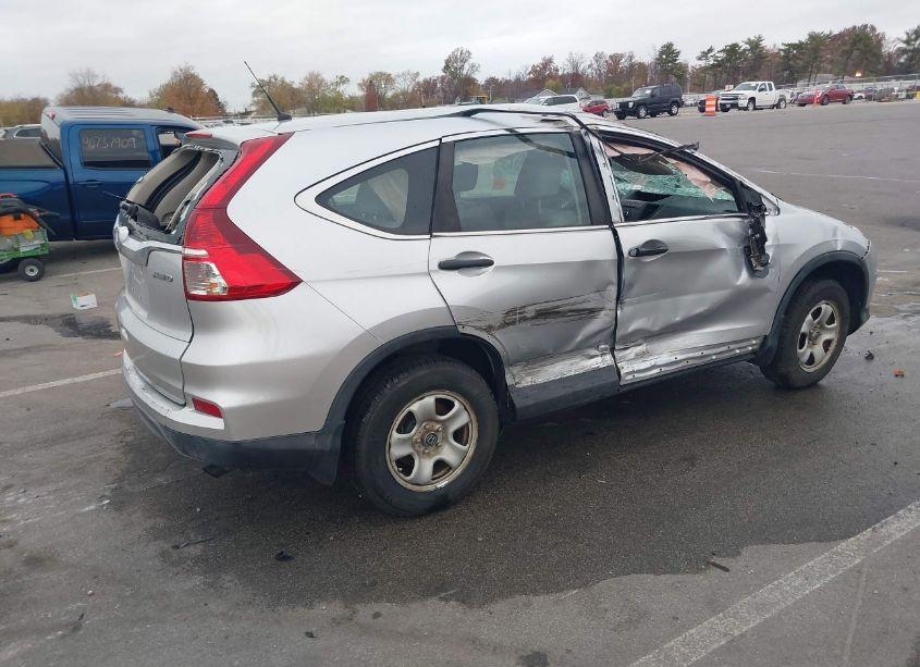 Photo 4 of 2015 Honda Cr-v LX (VIN 2HKRM4H39FH691767)