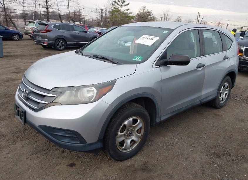 Photo 2 of 2013 Honda Cr-v LX (VIN 2HKRM4H3XDH687353)