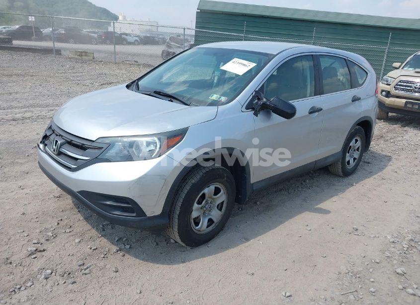 Photo 2 of 2014 Honda Cr-v LX (VIN 2HKRM4H3XEH686818)