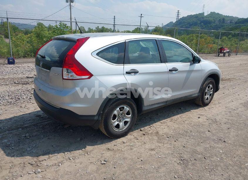 Photo 4 of 2014 Honda Cr-v LX (VIN 2HKRM4H3XEH686818)