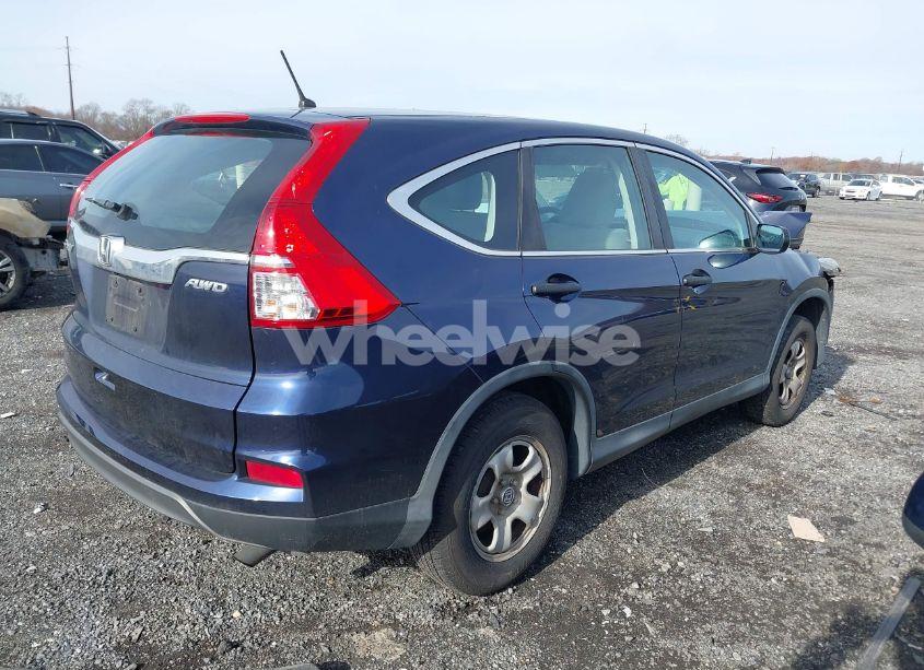 Photo 4 of 2015 Honda Cr-v LX (VIN 2HKRM4H3XFH693608)