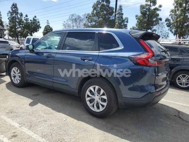 Photo 4 of 2023 HONDA CR-V LX (VIN 2HKRS3H28PH306367)