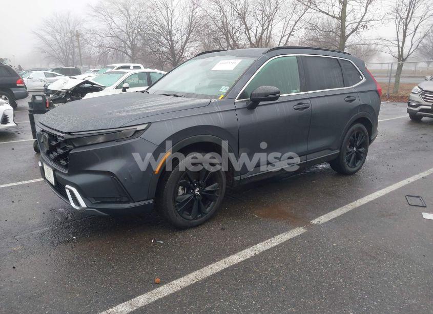 Photo 2 of 2023 Honda Cr-v HYBRID SPORT TOURING (VIN 2HKRS6H90PH807946)