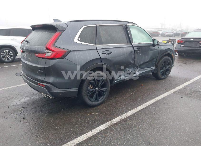 Photo 4 of 2023 Honda Cr-v HYBRID SPORT TOURING (VIN 2HKRS6H90PH807946)