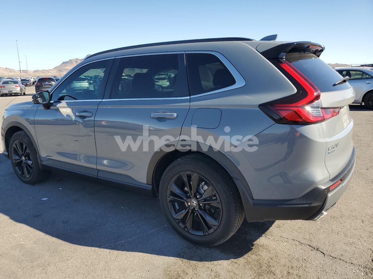 Photo 2 of 2023 HONDA CR-V SPORT TOURING (VIN 2HKRS6H90PH811091)