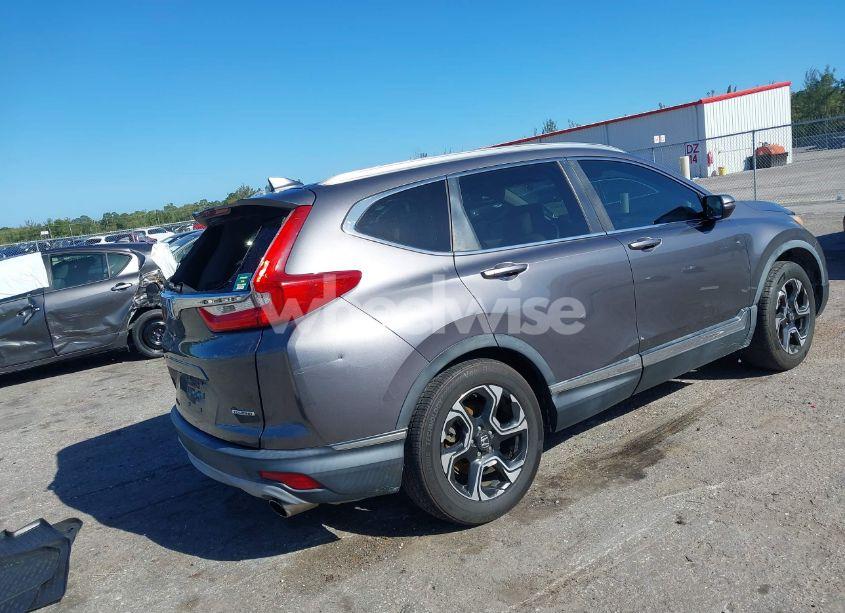 Photo 4 of 2017 Honda Cr-v TOURING (VIN 2HKRW1H91HH505686)