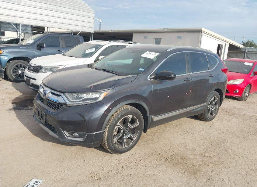 Photo 2 of 2017 Honda Cr-v TOURING (VIN 2HKRW1H96HH516750)