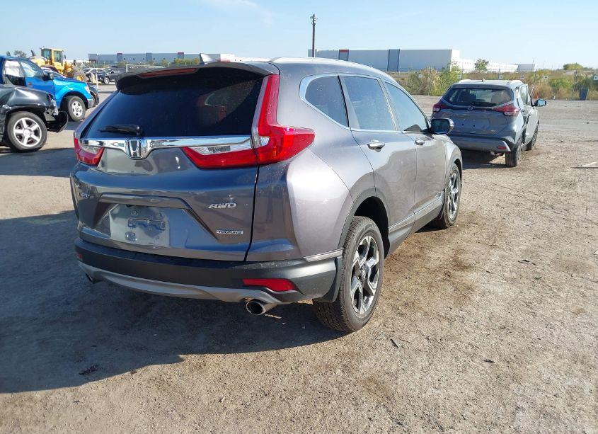 Photo 4 of 2017 Honda Cr-v TOURING (VIN 2HKRW2H91HH612467)