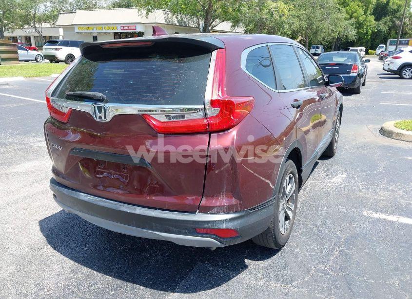 Photo 4 of 2019 Honda Cr-v LX (VIN 2HKRW5H32KH409284)