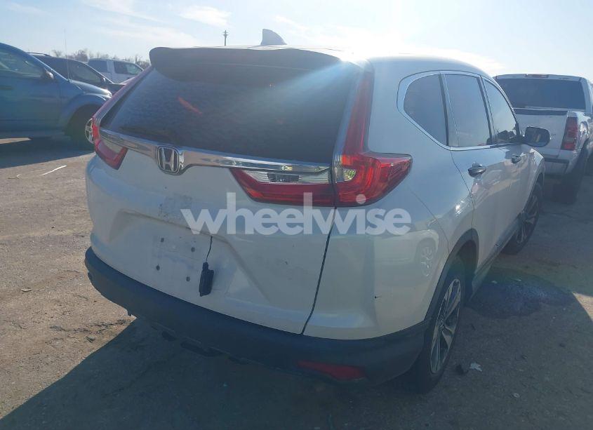 Photo 4 of 2018 Honda Cr-v LX (VIN 2HKRW5H35JH422013)