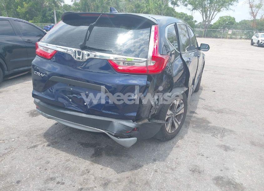 Photo 4 of 2018 Honda Cr-v LX (VIN 2HKRW5H37JH412065)