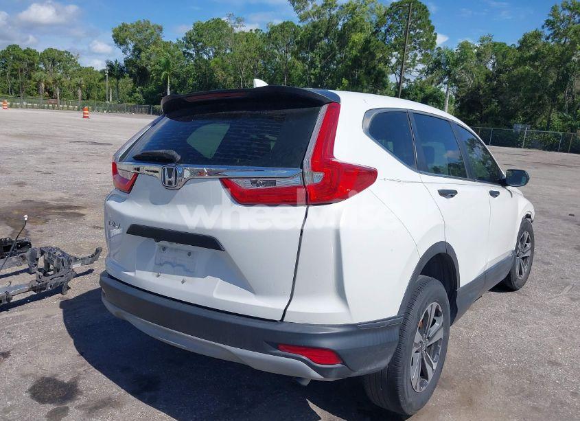 Photo 4 of 2019 Honda Cr-v LX (VIN 2HKRW5H37KH415825)