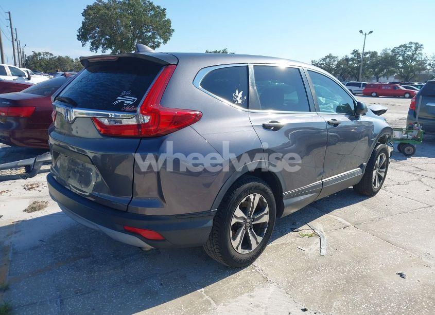 Photo 4 of 2019 Honda Cr-v LX (VIN 2HKRW5H39KH409959)