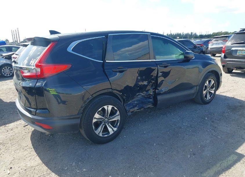 Photo 4 of 2019 Honda Cr-v LX (VIN 2HKRW5H3XKH413423)
