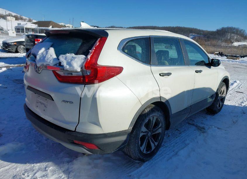 Photo 4 of 2017 Honda Cr-v LX (VIN 2HKRW6H31HH203033)