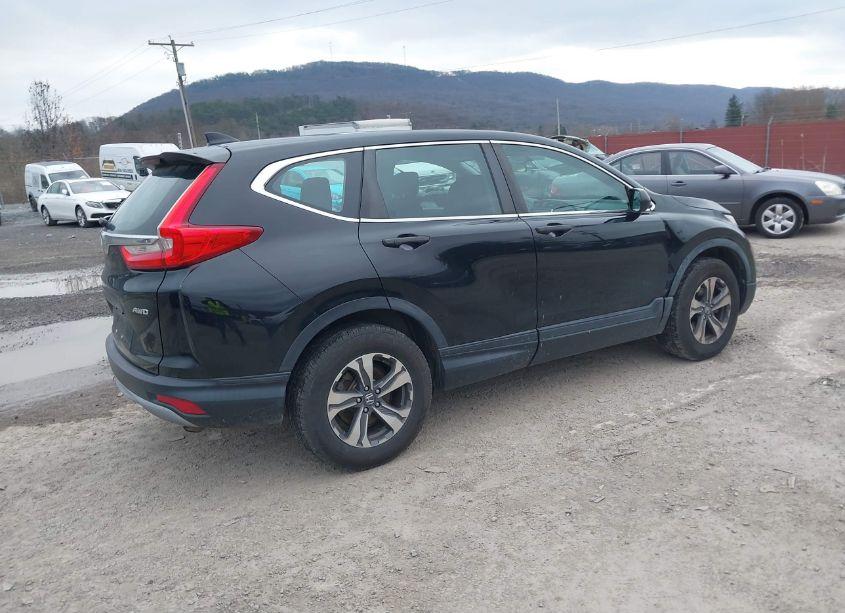 Photo 4 of 2017 Honda Cr-v LX (VIN 2HKRW6H34HH207318)
