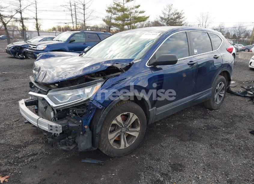 Photo 2 of 2017 Honda Cr-v LX (VIN 2HKRW6H36HH207031)