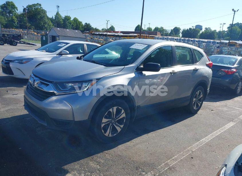 Photo 2 of 2019 Honda Cr-v LX (VIN 2HKRW6H36KH221499)