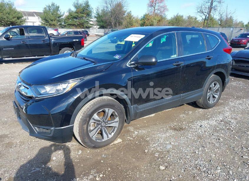 Photo 2 of 2019 Honda Cr-v LX (VIN 2HKRW6H37KH224069)